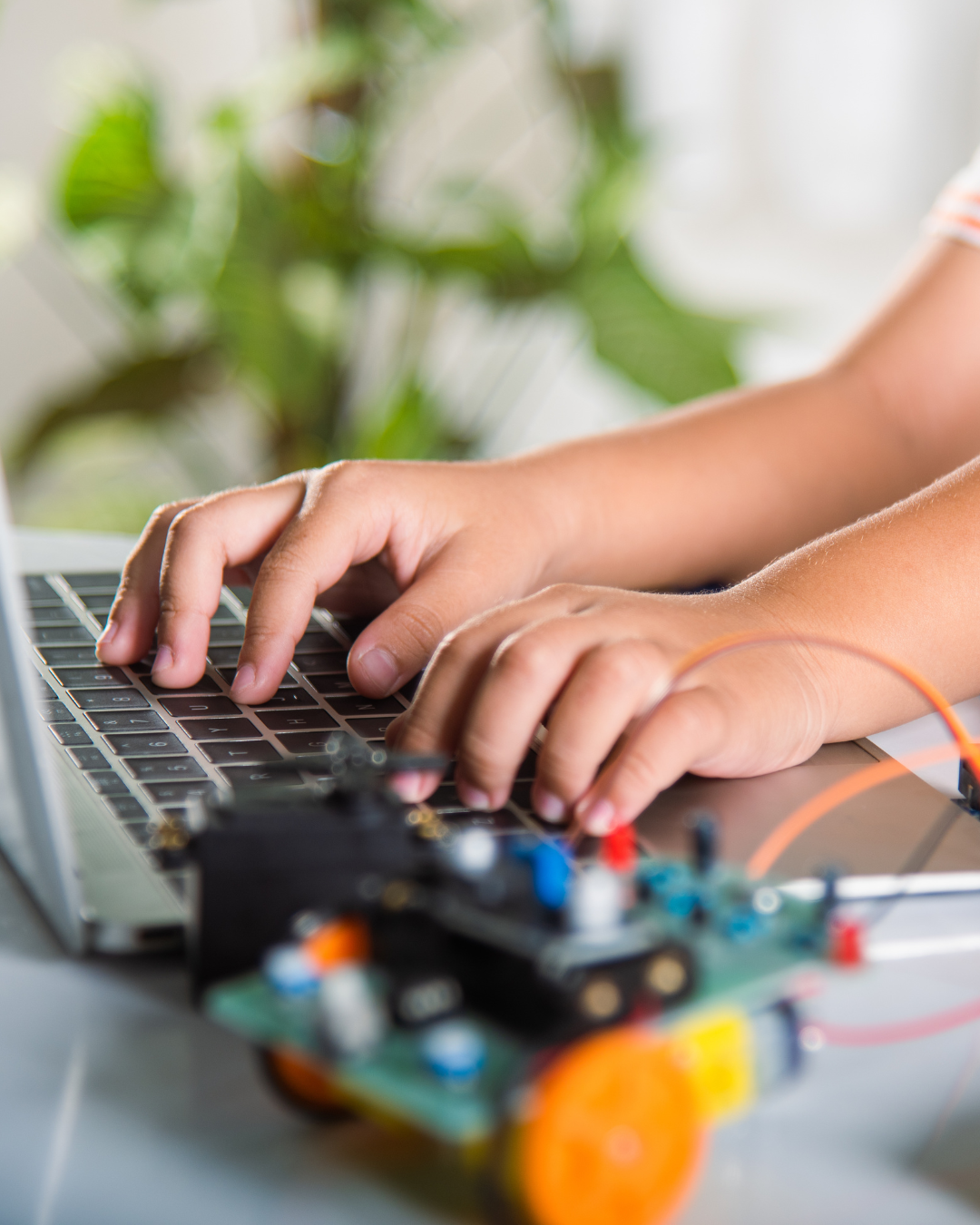 Kid working on robotics