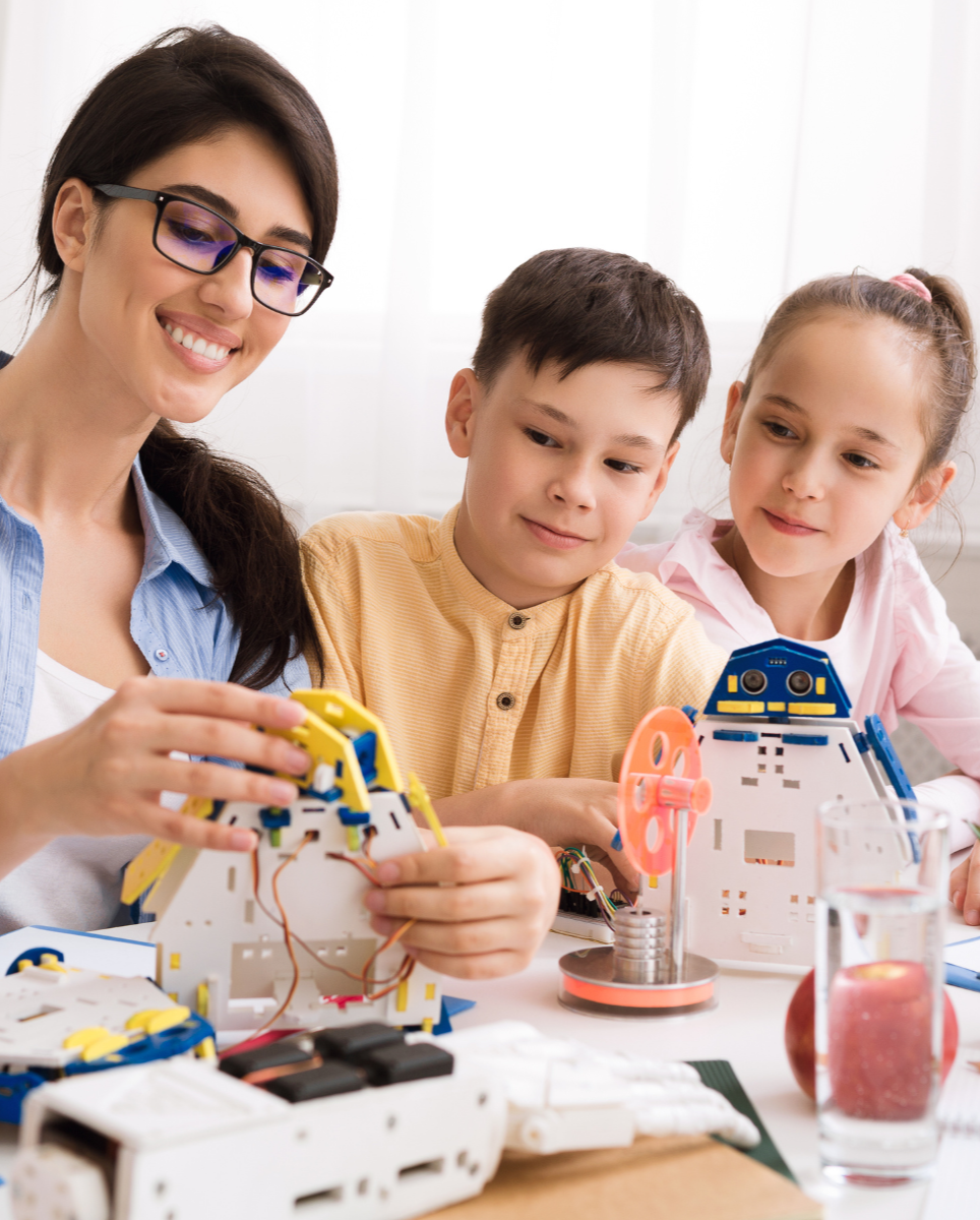 Woman Teaching Students STEM