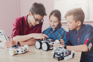 Young kids doing robotics